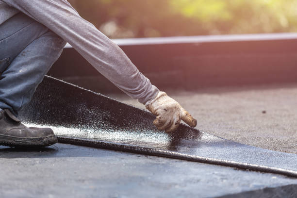 Professional Basement Waterproofing technician working in Montpelier Station, VA
